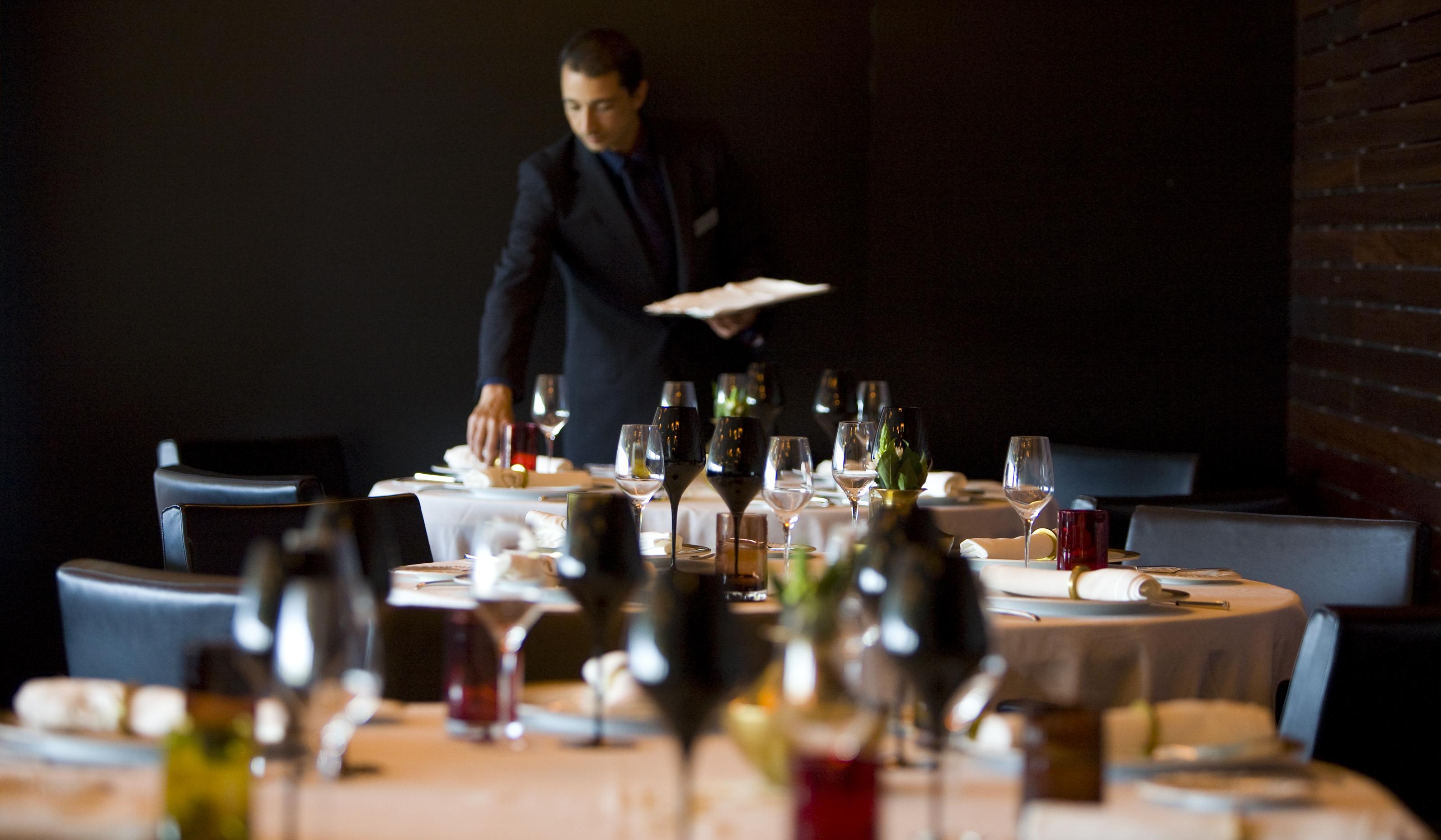 Altis Belem Hotel & Spa, A Member Of Design Hotels Lisbon Exterior photo A waiter clearing a table